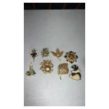 Miscellaneous gold and silver tone brooches