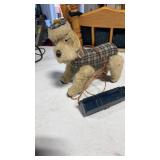 Blue sitting Scotty, electronic battery, dog