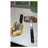 Pocket knives and a hatchet with a sheath