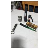 Pocket knife , Marlboro, flashlight , Nebraska,