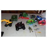 Grouping of Kids Trucks and Toys