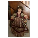 Porcelain Doll with Floral Dress on Stand approx