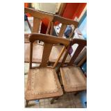 4 wooden chairs with leather seats
