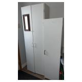 2 white 2 door cabinets  tall one is