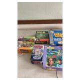 Large lot of board games and puzzles
