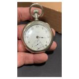 Elgin pocket watch with railroad engine engraved