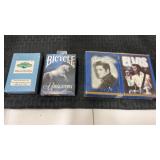 4  sealed decks of playing cards  Elvis and more