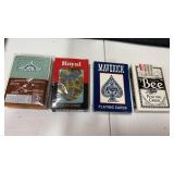 4 sealed decks of playing cards