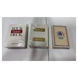 3 sealed decks of playing cards Basic cigarettes