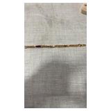 Gold tone wrist band