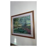 framed and matted colorful picture of a pond