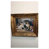 Ornate frame with a picture of a baby and collie