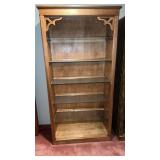 Lighted wooden book shelf with glass shelves