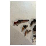 Small key chain sized fake guns