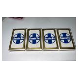 4 sealed packages of Santa Fe playing cards