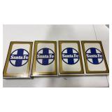 4 sealed packages of Santa Fe playing cards