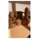 Six decalb stoneware, coffee, mugs creamer, and