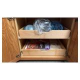 Contents of cabinet both shelves: miscellaneous