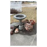 Outdoor concrete bird bath and pots