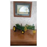 To John Deere model tractors one Ertle, John