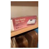 Steam vaporizer with box