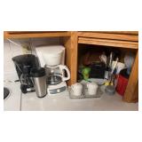 2 coffee makers and contents of bread cabinet