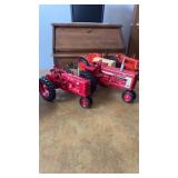 Two McCormick Farm Mall diecast model tractors,