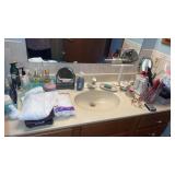 Large grouping of bathroom items , brushes ,