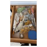 Contents of drawer: corn on cob skewers, rolling