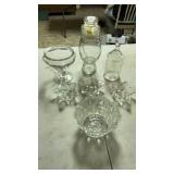 3 glass jars, 3 candle holders and one glass