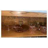 Pink depression glass dishes and yellow dishes