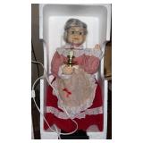 Animated and illuminated Christmas display figure