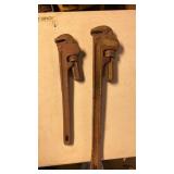 2 large pipe wrenches