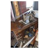 THE ELGIN SEWING machine in wooden and iron desk