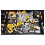 Drawer of tape measures and more