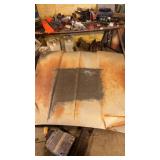Scrap hood to a Pontiac