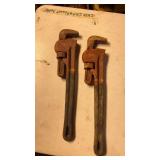 2 large pipe wrenches