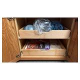 Contents of cabinet both shelves: miscellaneous