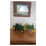To John Deere model tractors one Ertle, John