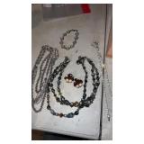 Miscellaneous silver tone necklaces and clip