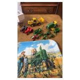 Large lot of small toy tractors including John