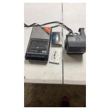 GE cassette tape recorder and Polaroid sun600