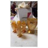 Jeannette depression glass pitcher and glasses