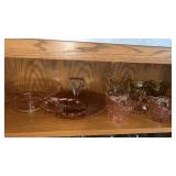 Pink depression glass dishes and yellow dishes
