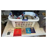Laundry basket with miscellaneous books