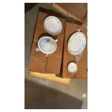 Approximately 30-40+ pieces of china set appear