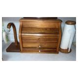 Wooden bread box , banana tree and paper towel
