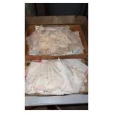 Group of large and small doilies and