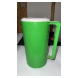 20 lbs 2oz unsearched Pennieï¿½s in a green pitcher