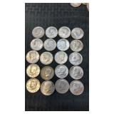 Mixed dates Kennedy hold dollars. $20